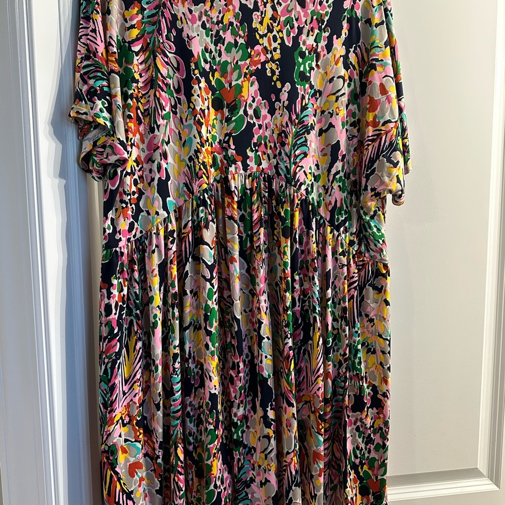 This is a fun colorful dress that can be dressed up or dressed down